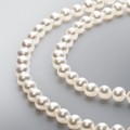 Endless Pearl Necklace with White Freshwater 7.0 - 6.5 mm Pearls